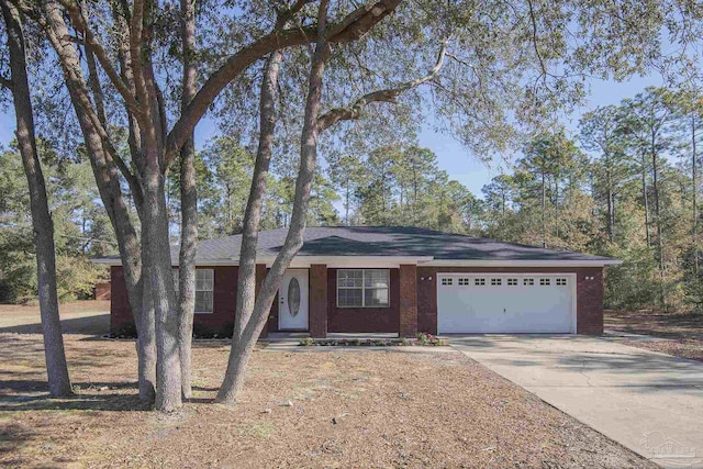 single story home with a garage