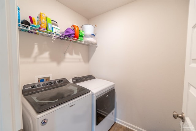 laundry area featuring washer and clothes dryer