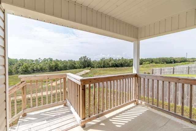 deck featuring a lawn