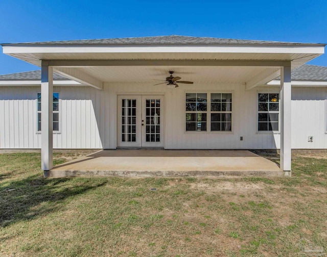 back of house featuring french doors, roof with shingles, a lawn, a patio area, and ceiling fan