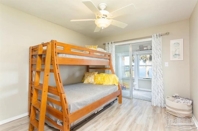 bedroom with hardwood / wood-style flooring and ceiling fan