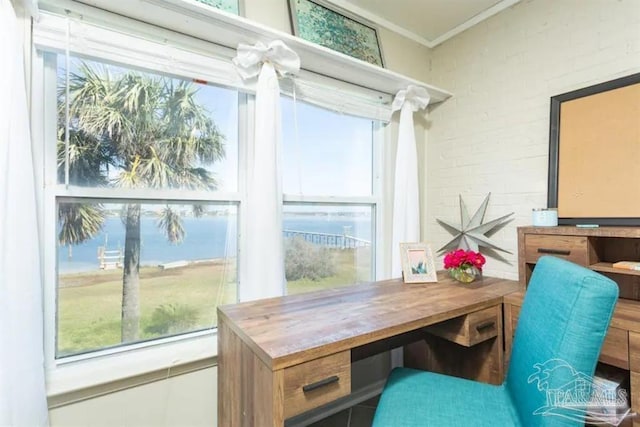 home office with brick wall and ornamental molding