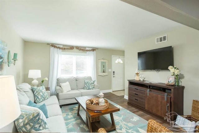 living room with dark hardwood / wood-style floors