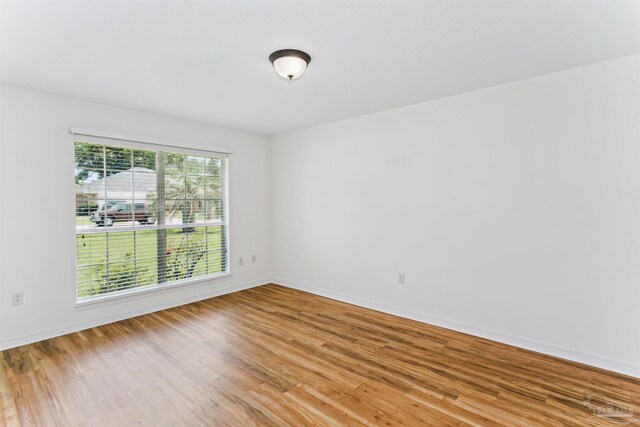4803 Jaimee Leigh Dr, Milton, FL 32570 - unfurnished room featuring wood finished floors and baseboards