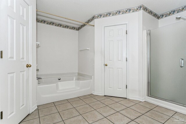 4803 Jaimee Leigh Dr, Milton, FL 32570 - bathroom with tile patterned floors and enclosed tub / shower combo
