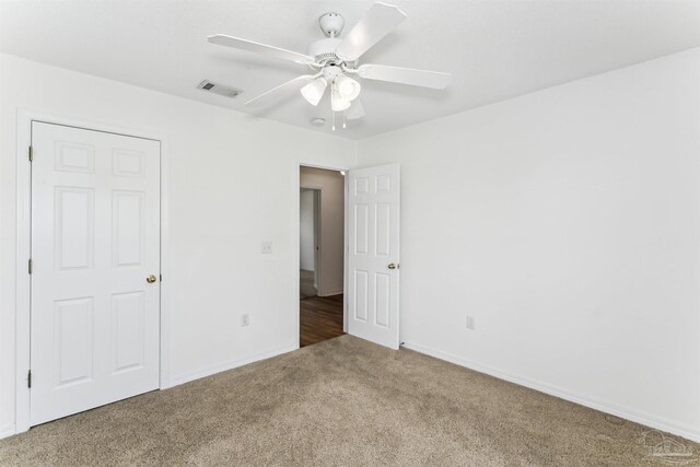 4803 Jaimee Leigh Dr, Milton, FL 32570 - unfurnished bedroom featuring carpet flooring, ceiling fan, and baseboards