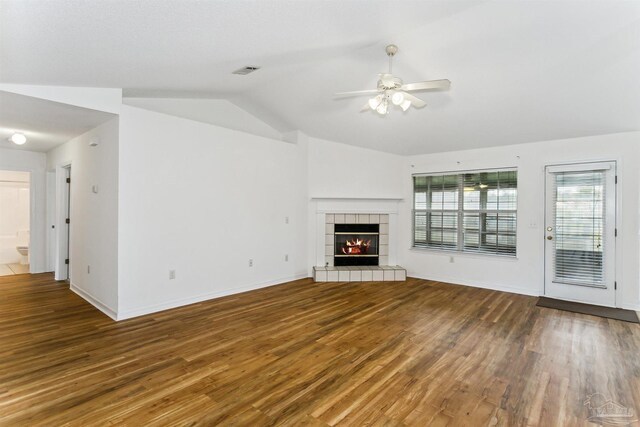 4803 Jaimee Leigh Dr, Milton, FL 32570 - unfurnished living room with lofted ceiling, ceiling fan, wood finished floors, a fireplace, and baseboards