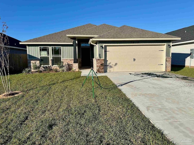 view of front facade with board and batten siding, an attached garage, brick siding, driveway, and roof with shingles