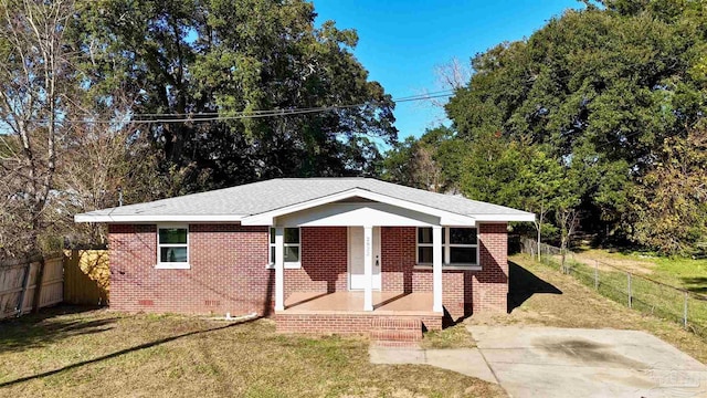 view of front of home with a porch and a front lawn