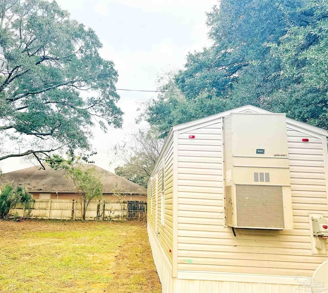 view of outbuilding featuring a yard