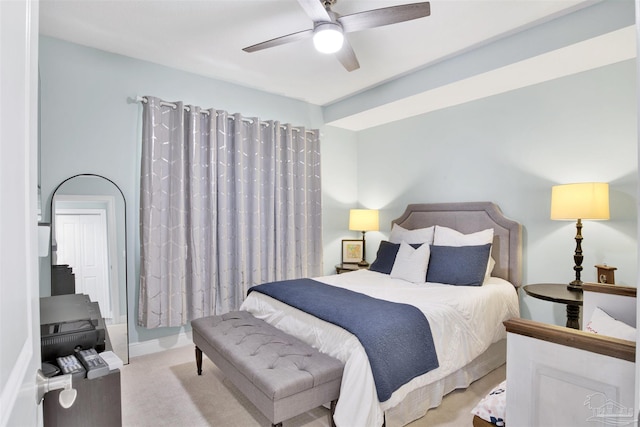 carpeted bedroom featuring ceiling fan
