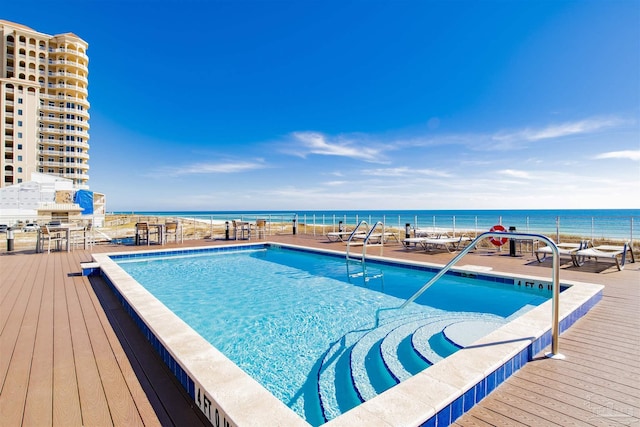 community pool featuring a water view