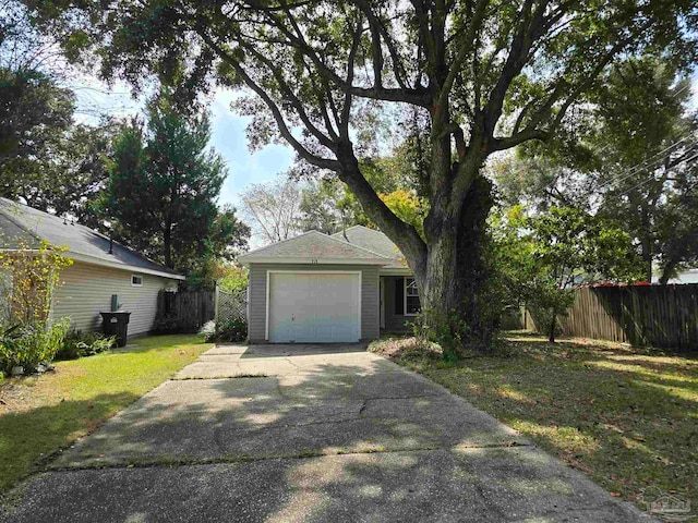 garage featuring a yard