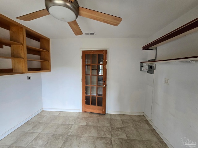 empty room featuring ceiling fan