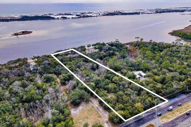 721 W Miracle Strip Pkwy, Mary Esther, FL 32569 - birds eye view of property with a water view