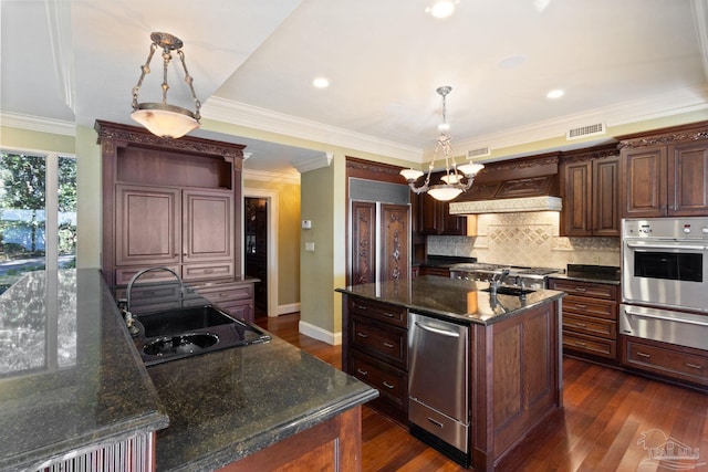 721 W Miracle Strip Pkwy, Mary Esther, FL 32569 - kitchen featuring visible vents, premium range hood, stainless steel oven, a warming drawer, and a sink