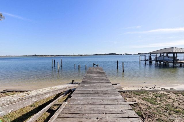 721 W Miracle Strip Pkwy, Mary Esther, FL 32569 - view of dock featuring a water view