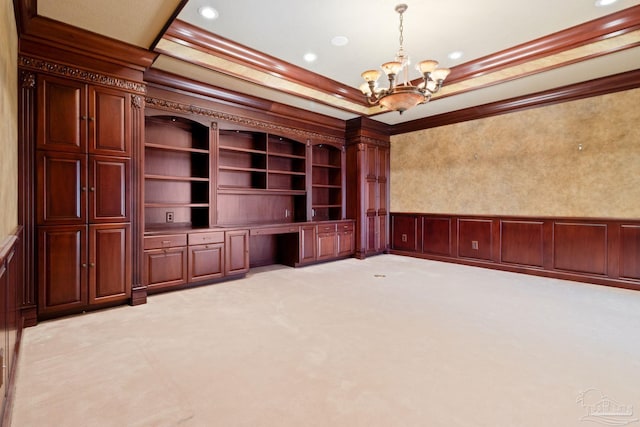 721 W Miracle Strip Pkwy, Mary Esther, FL 32569 - unfurnished office with a wainscoted wall, crown molding, a notable chandelier, and built in desk