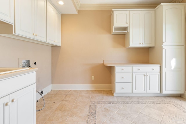 721 W Miracle Strip Pkwy, Mary Esther, FL 32569 - clothes washing area featuring baseboards, washer hookup, light tile patterned floors, cabinet space, and electric dryer hookup