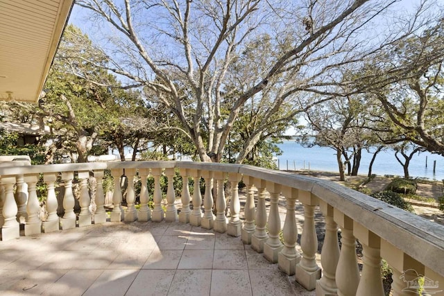 721 W Miracle Strip Pkwy, Mary Esther, FL 32569 - view of patio with a balcony and a water view