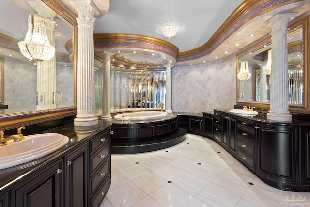 721 W Miracle Strip Pkwy, Mary Esther, FL 32569 - bathroom with vanity, decorative columns, a bath, and ornamental molding