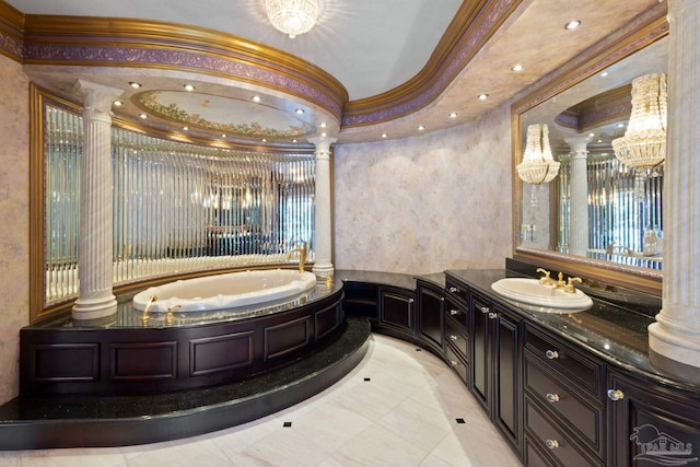 721 W Miracle Strip Pkwy, Mary Esther, FL 32569 - full bathroom with a tray ceiling, ornamental molding, a bath, vanity, and ornate columns