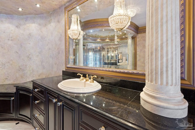 721 W Miracle Strip Pkwy, Mary Esther, FL 32569 - bathroom featuring a notable chandelier, recessed lighting, and vanity