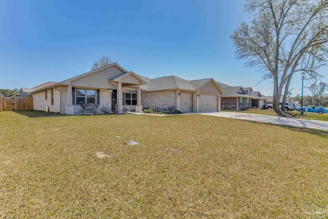 single story home with a front yard, fence, concrete driveway, a garage, and brick siding