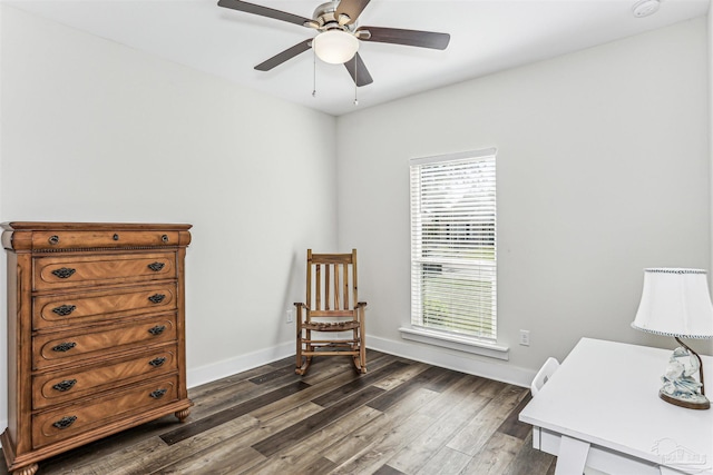 1664 Granite Ln, Cantonment, FL 32533 - sitting room featuring dark wood-type flooring, ceiling fan, baseboards, and a desk