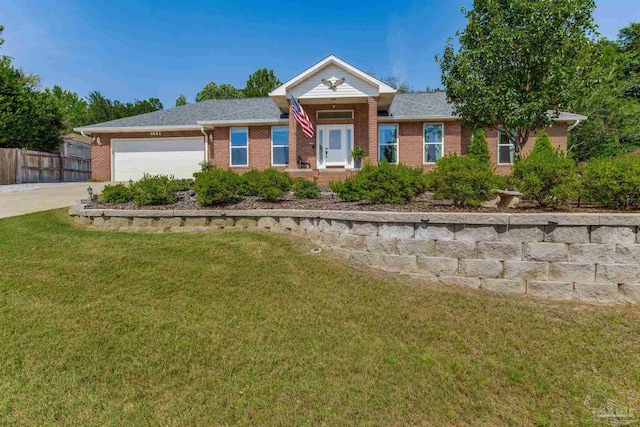 4661 Browning Ct, Crestview, FL 32539 - ranch-style house featuring brick siding, a garage, and concrete driveway