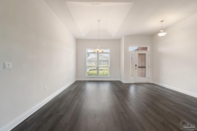 5619 Burr St, Milton, FL 32570 - unfurnished dining area with baseboards, dark wood-style flooring, and a chandelier