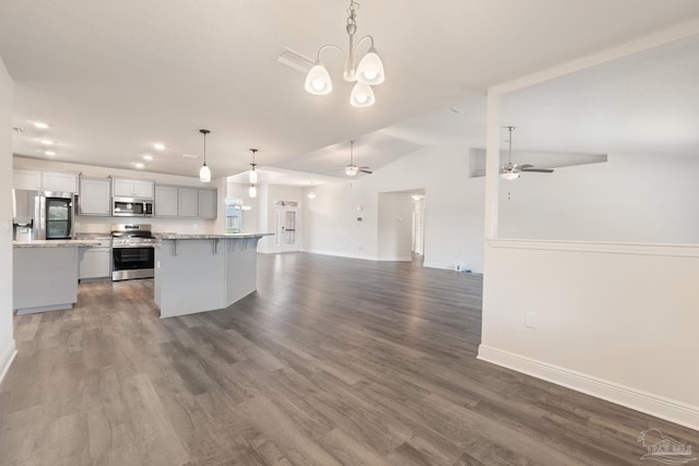 5619 Burr St, Milton, FL 32570 - kitchen featuring appliances with stainless steel finishes, baseboards, ceiling fan with notable chandelier, and open floor plan
