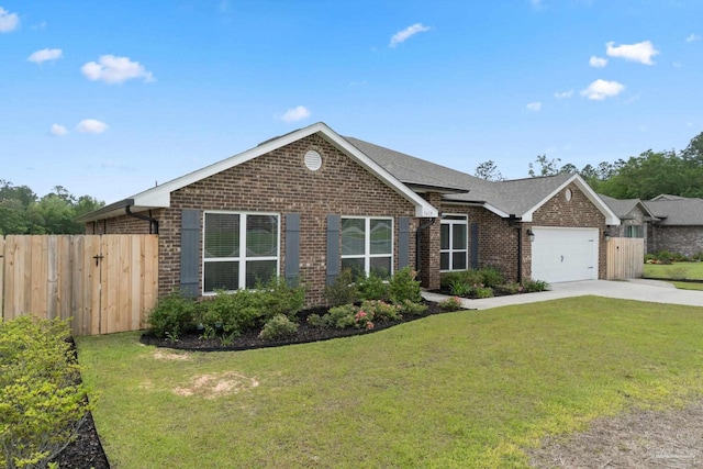 5619 Burr St, Milton, FL 32570 - view of front of home featuring fence, an attached garage, brick siding, a front yard, and driveway