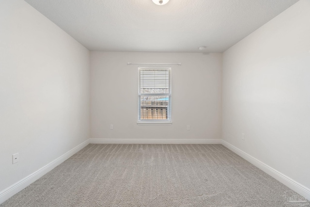 5619 Burr St, Milton, FL 32570 - spare room with baseboards and light carpet