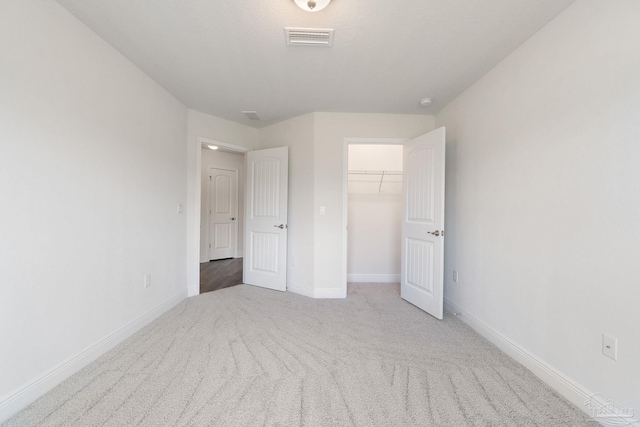 5619 Burr St, Milton, FL 32570 - unfurnished bedroom featuring baseboards, a closet, carpet floors, and visible vents