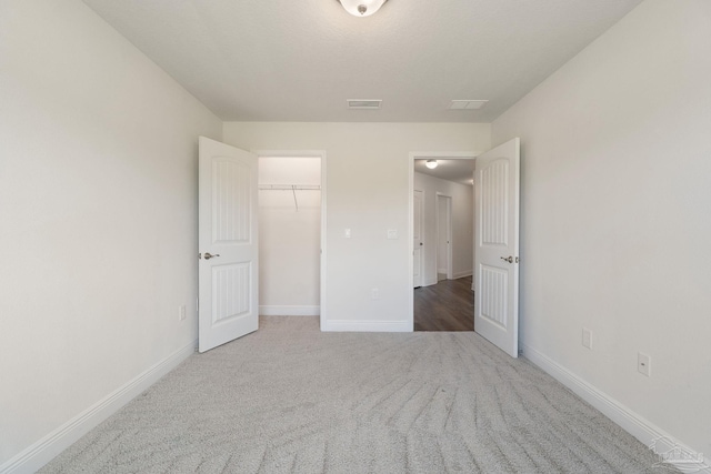 5619 Burr St, Milton, FL 32570 - unfurnished bedroom with visible vents, carpet flooring, and baseboards