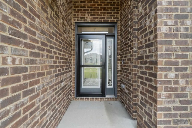 5619 Burr St, Milton, FL 32570 - doorway to property with brick siding