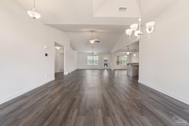 5619 Burr St, Milton, FL 32570 - unfurnished living room featuring ceiling fan with notable chandelier, baseboards, lofted ceiling, visible vents, and dark wood-style floors