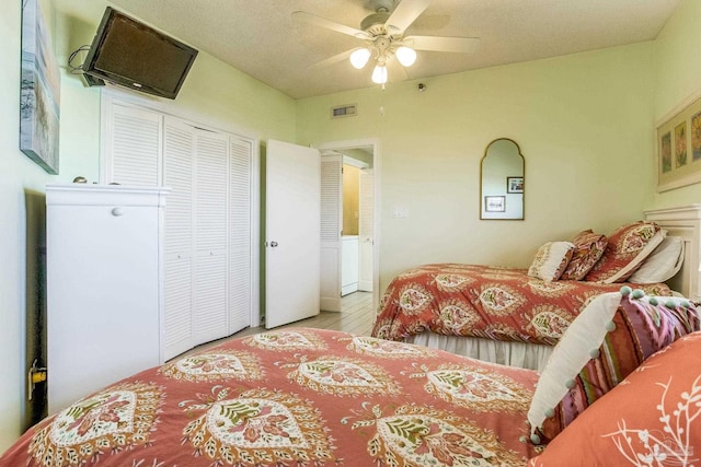 bedroom featuring a closet and ceiling fan