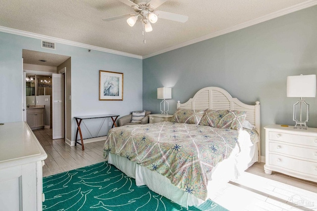 bedroom with connected bathroom, ceiling fan, crown molding, and a textured ceiling