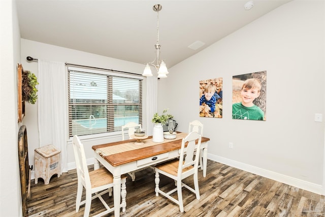 dining space with lofted ceiling, light wood finished floors, and baseboards