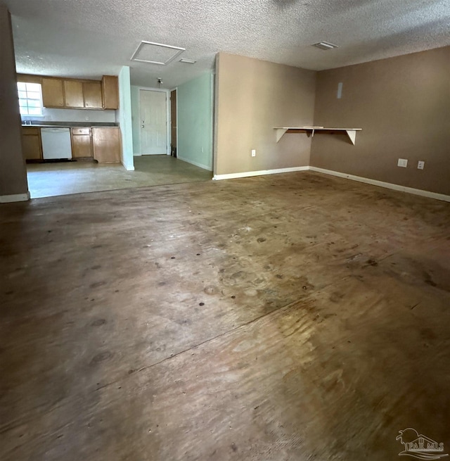 unfurnished living room with a textured ceiling