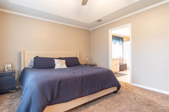 bedroom featuring ceiling fan, light colored carpet, and crown molding