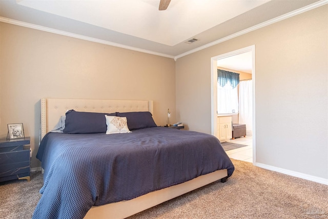 carpeted bedroom featuring ensuite bathroom, ornamental molding, visible vents, and baseboards