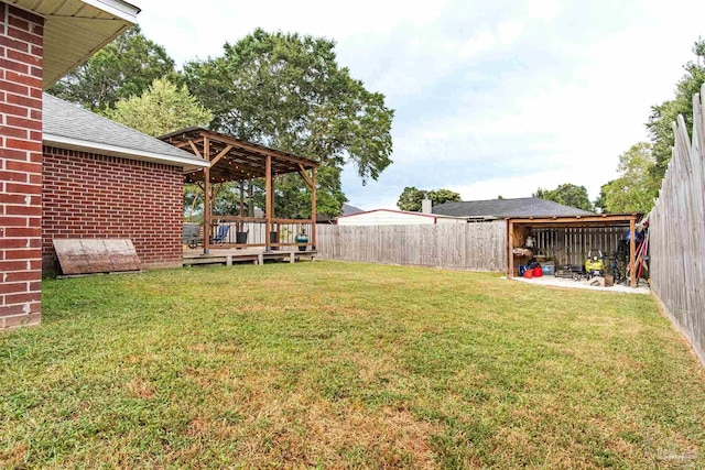 view of yard featuring a fenced backyard and a wooden deck