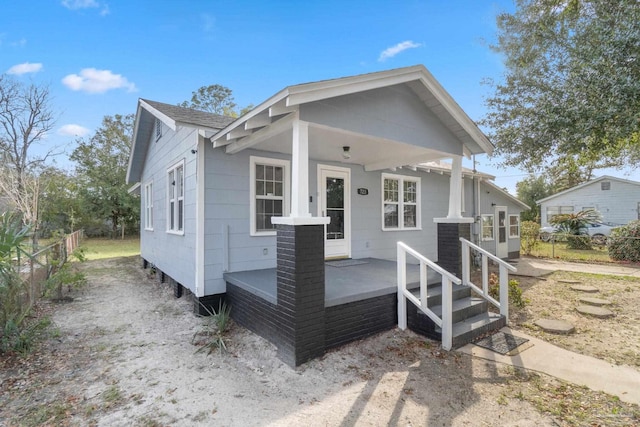 view of front of property featuring covered porch