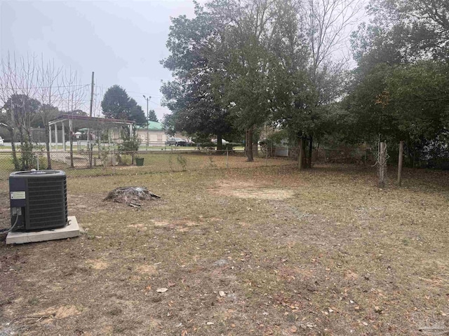 view of yard featuring central AC