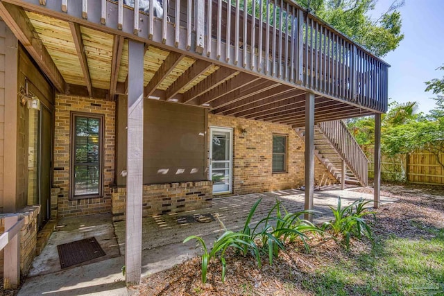 4831 E Olive Rd Unit 2A, Pensacola, FL 32514 - entrance to property featuring brick siding and a deck