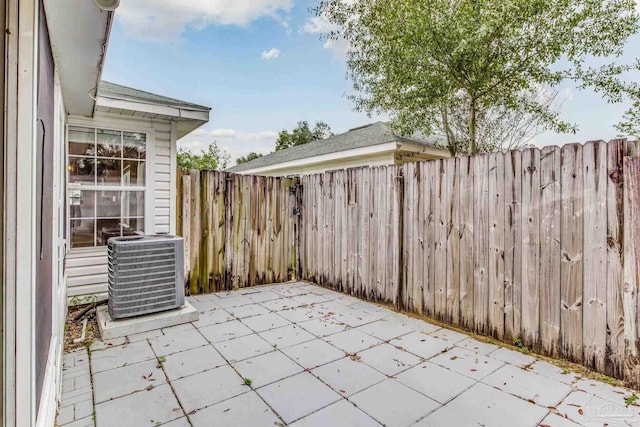 view of patio featuring central AC unit