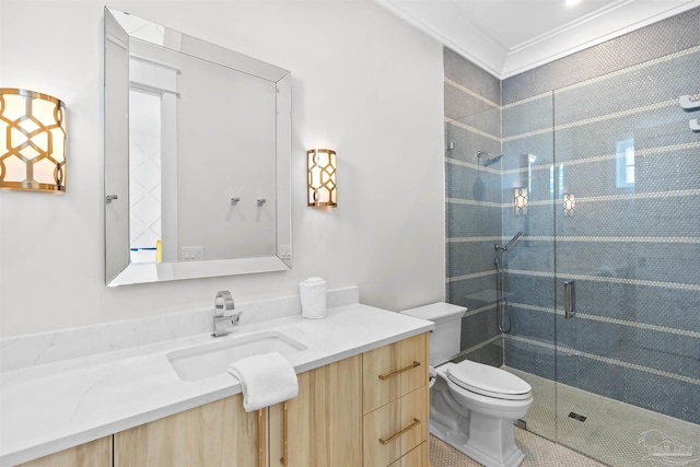 bathroom with toilet, a shower with shower door, crown molding, vanity, and tile patterned flooring